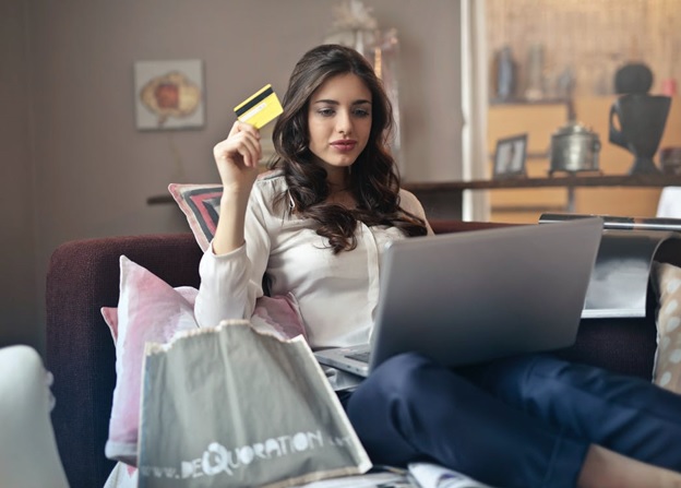 Lady purchasing products online.