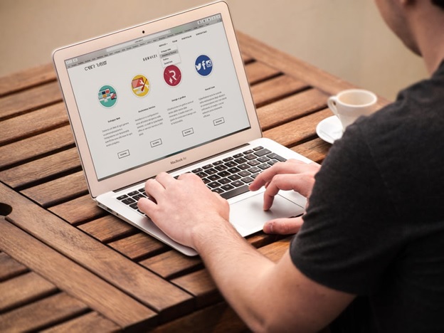 Man designing a website for a new business.