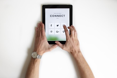 a person logging in to various social media accounts