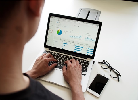 person viewing marketing analytics